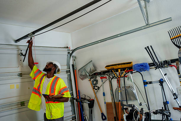 Professional Garage Door Panel Replacement technician working in Fiskdale, MA